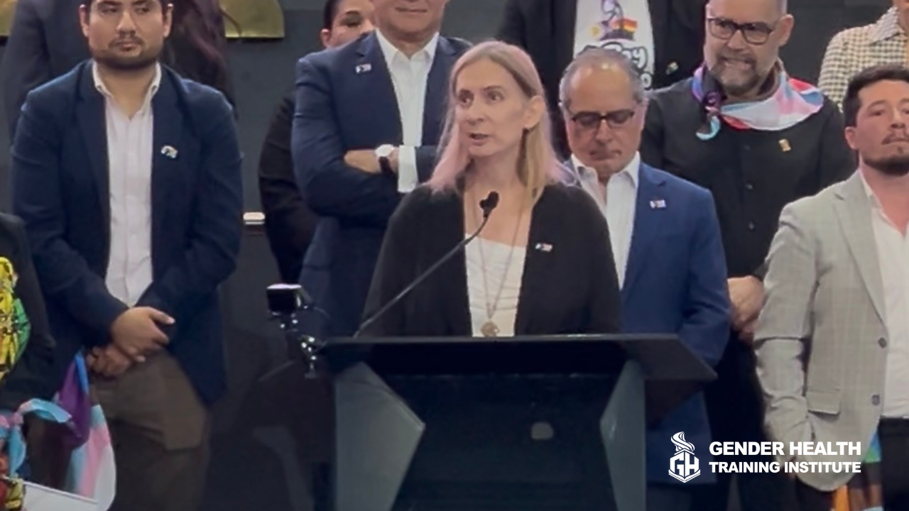 Juliette Greenham, CFO of the Gender Health Training Institute, celebrating a historic moment at Ring the Bell for LGBTIQ+ Equality 2026